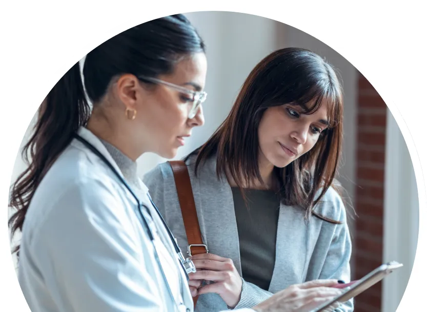 doctor and patient looking at tablet
