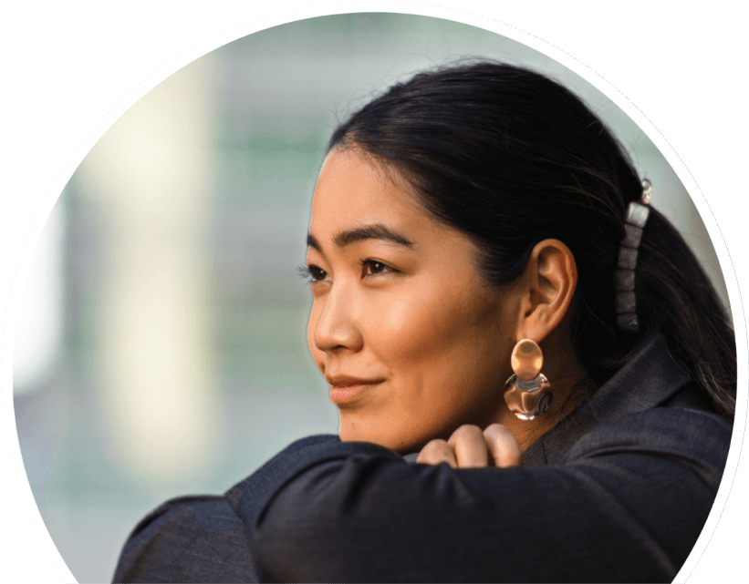 woman looking off into the distance and smiling